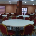 Banquet hall with collapsible tables and banquet chairs
